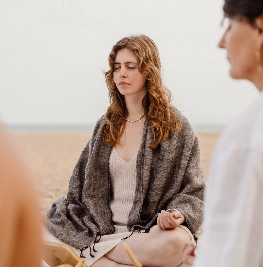 Florence Seck meditating outdoors